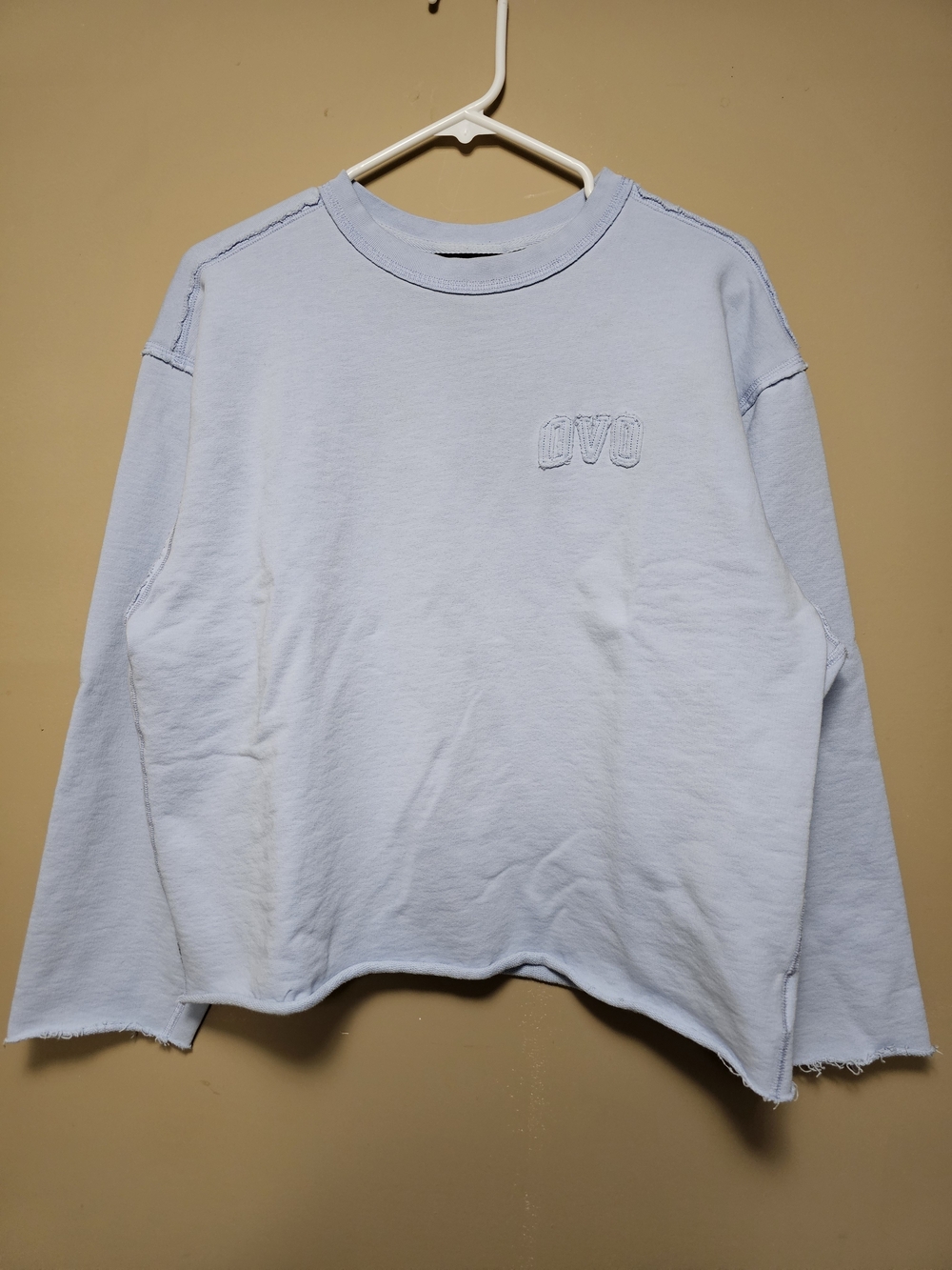 October’s Very Own (OVO) Cropped Raw-Hem Sweatshirt – Light Blue